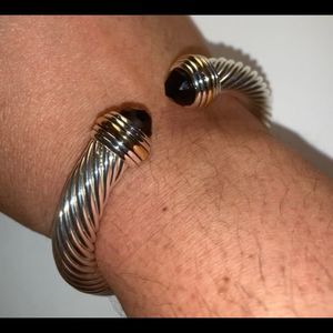 Thick bracelet with black end stones
